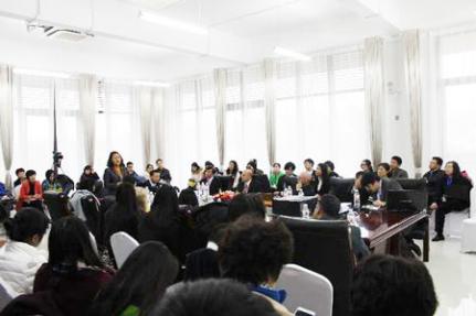 large conference room filled with 50 people